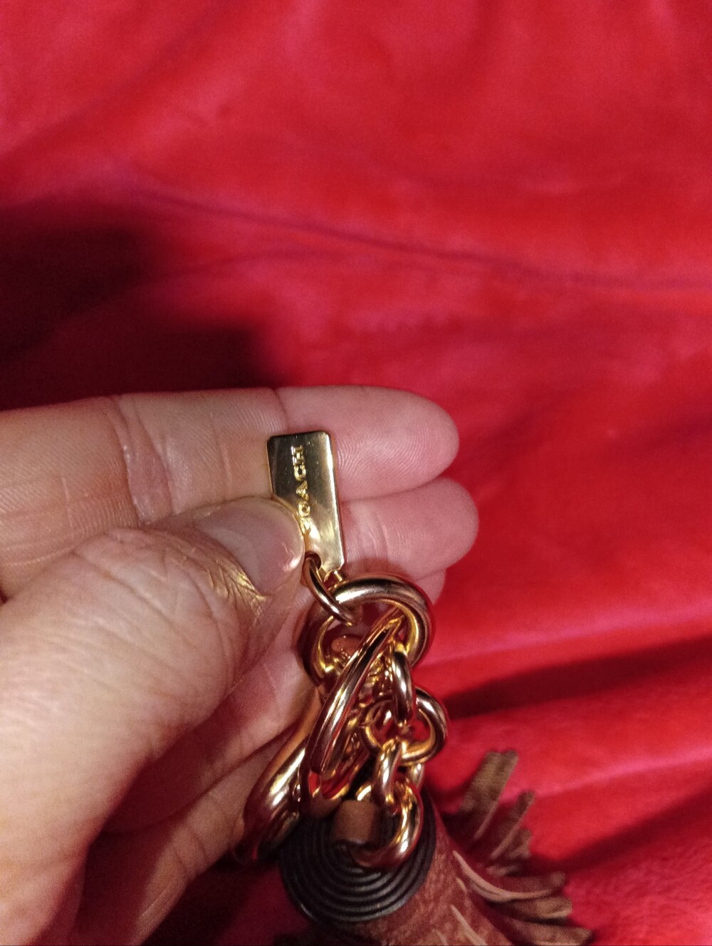 Coach Signature Tan Tassel Keychain with Gold Hardware - Picture 6 of 6